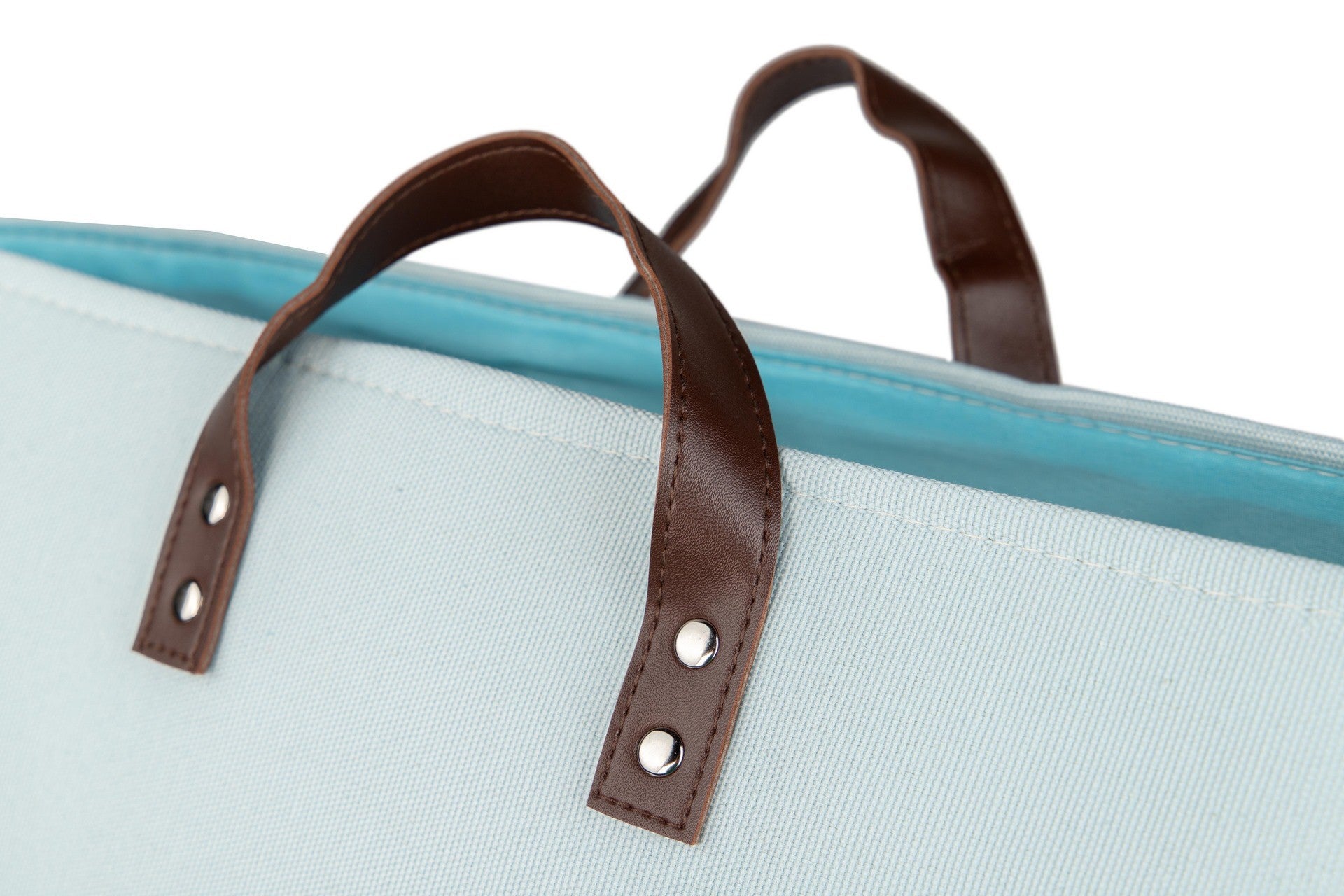 Bolsa azul claro com alças de couro castanho e interior azul