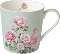 Caneca verde claro com desenhos de rosas cor-de-rosa e folhas verdes