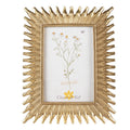 Moldura dourada com textura em padrão de raios e imagem de flores com texto Clayre & Eef
