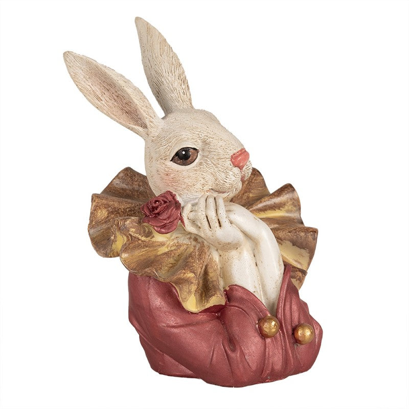 Escultura decorativa de coelho com roupa vermelha e dourada
