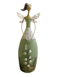 Estatueta de fada decorativa com vestido verde e branco e asas douradas