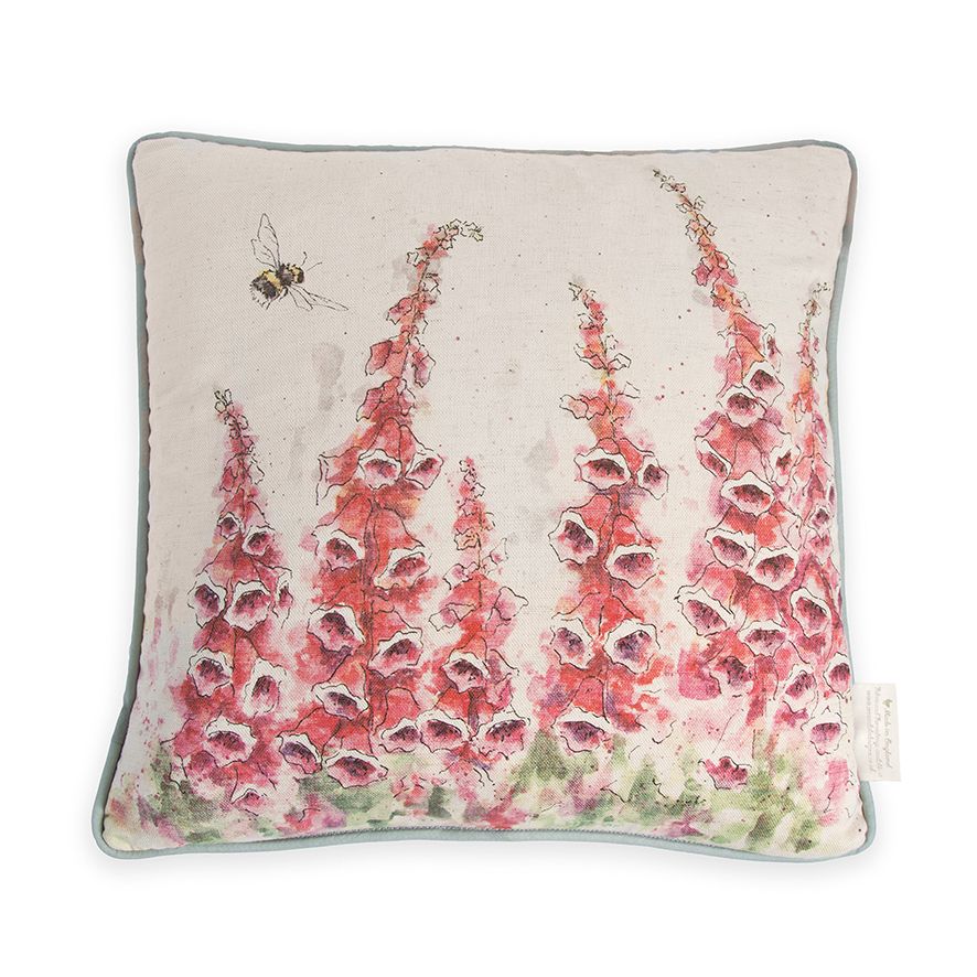 Almofada quadrada com estampa floral cor-de-rosa e abelha