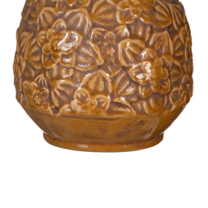 Vaso de cerâmica castanho com padrão floral em relevo
