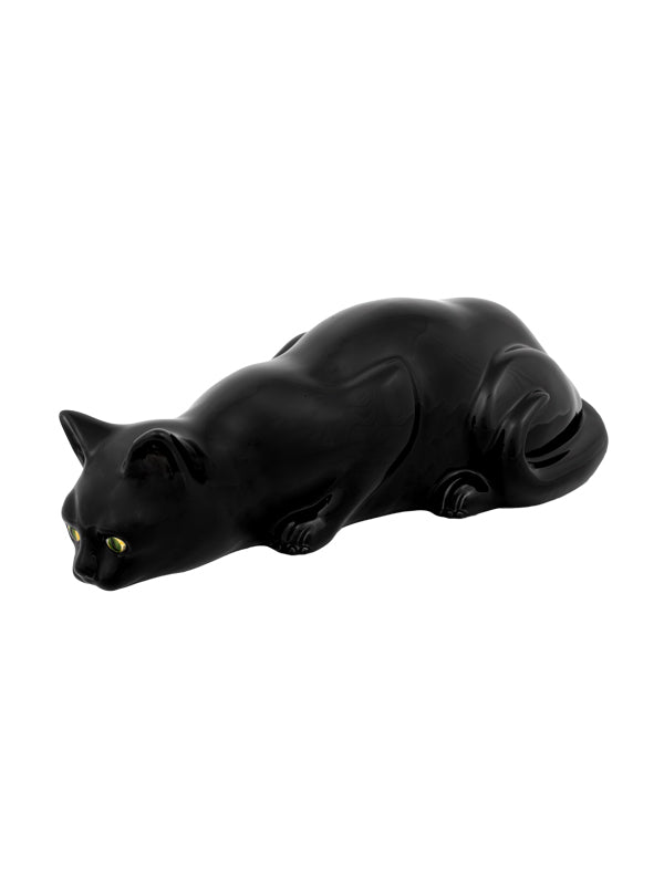 Figura decorativa de gato preto com olhos amarelos em fundo branco