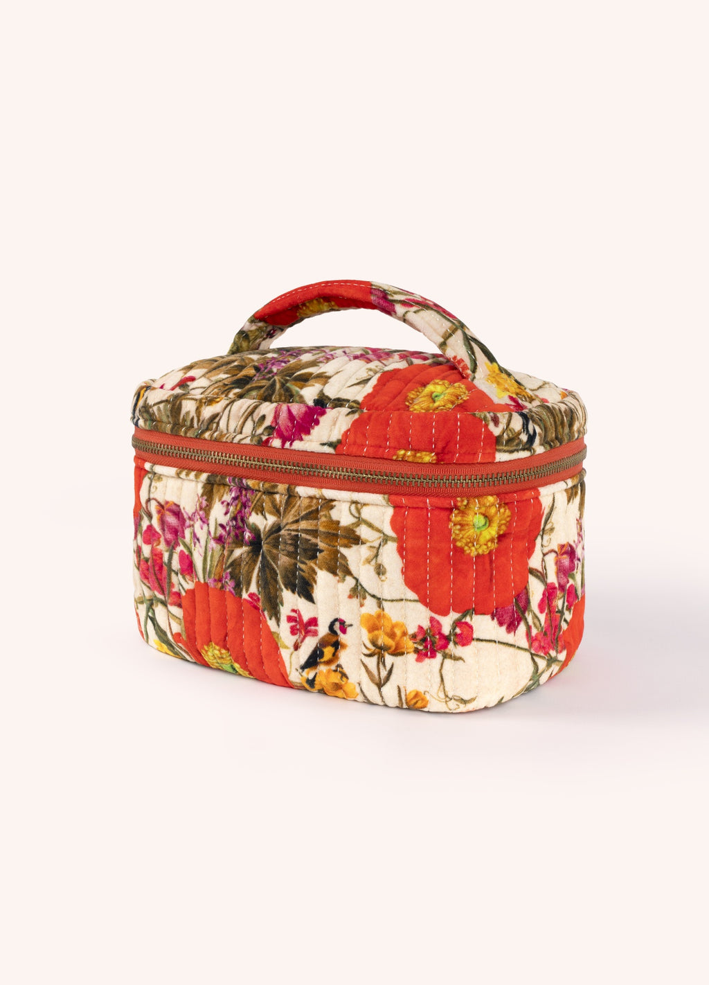 Bolsa tecido acolchoado com padrão floral e alça