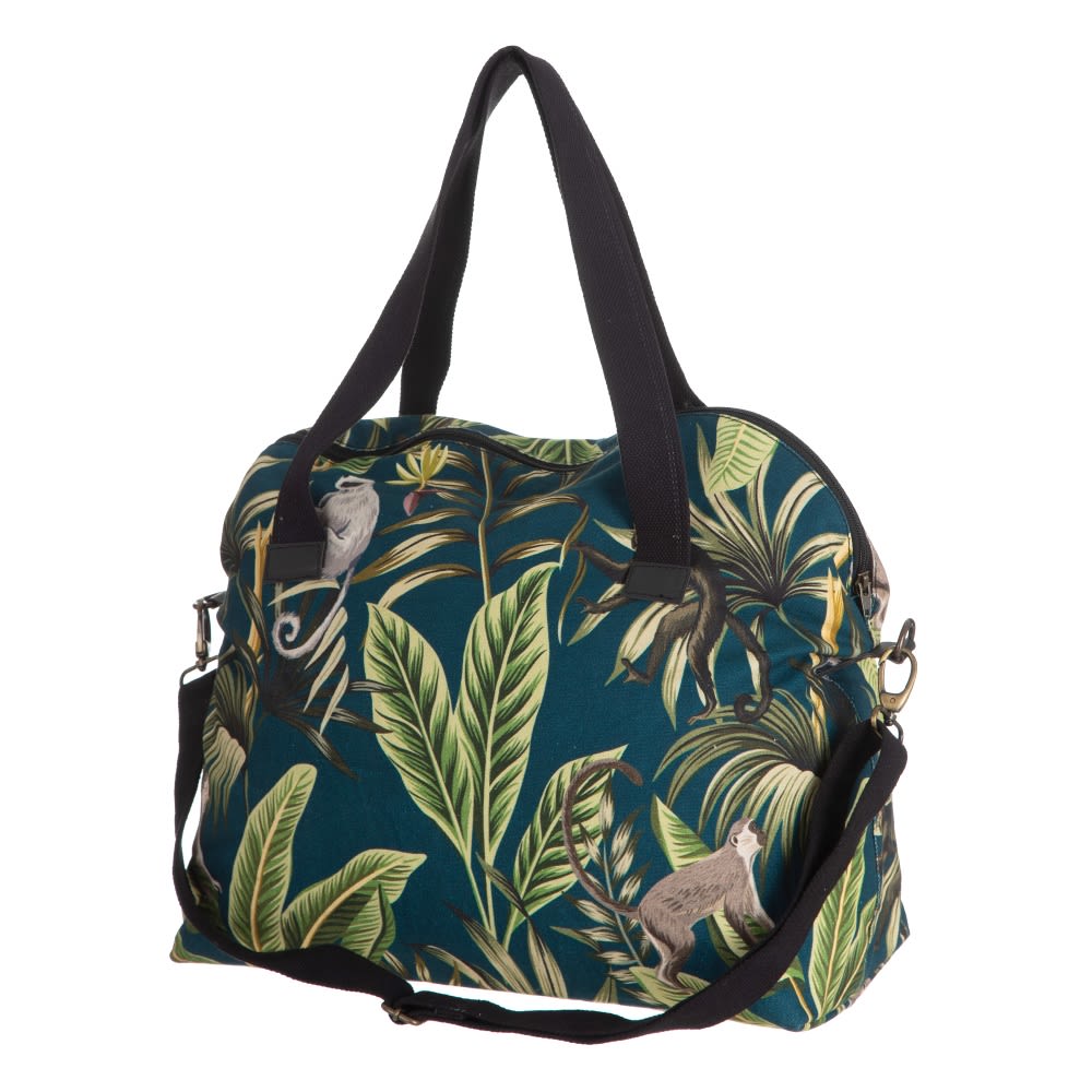 Bolsa tropical com estampado de folhas e macacos e alças pretas