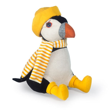 Boneco de pelúcia de papa-formigas com roupa amarela sentado