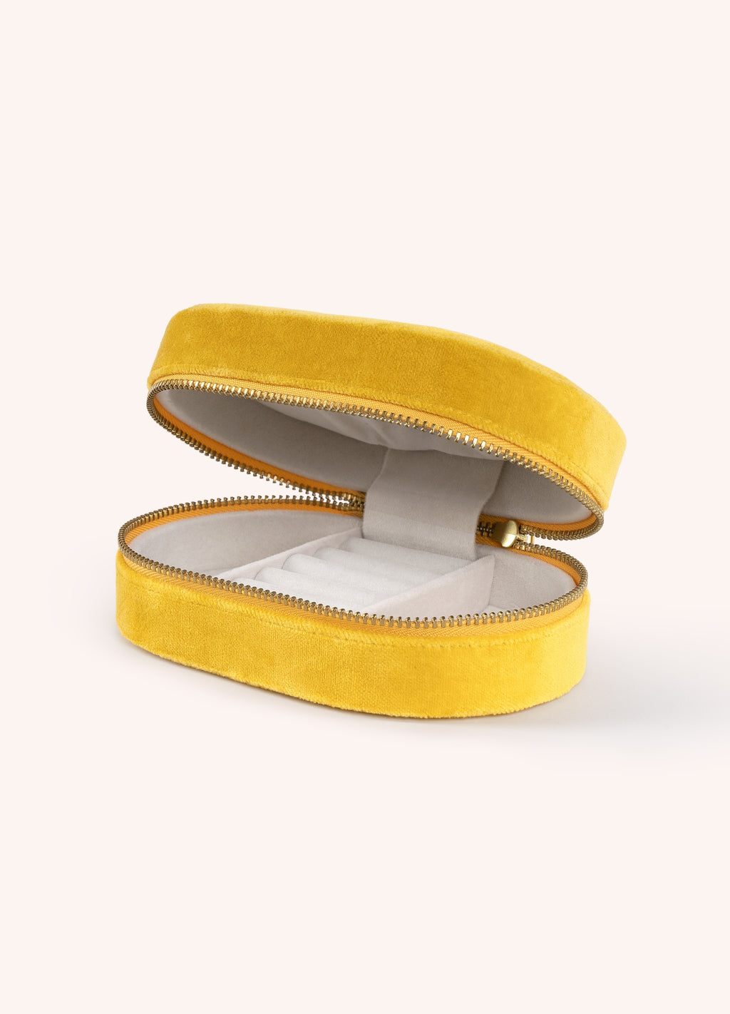 Estojo oval amarelo de veludo para joias com fecho de correr