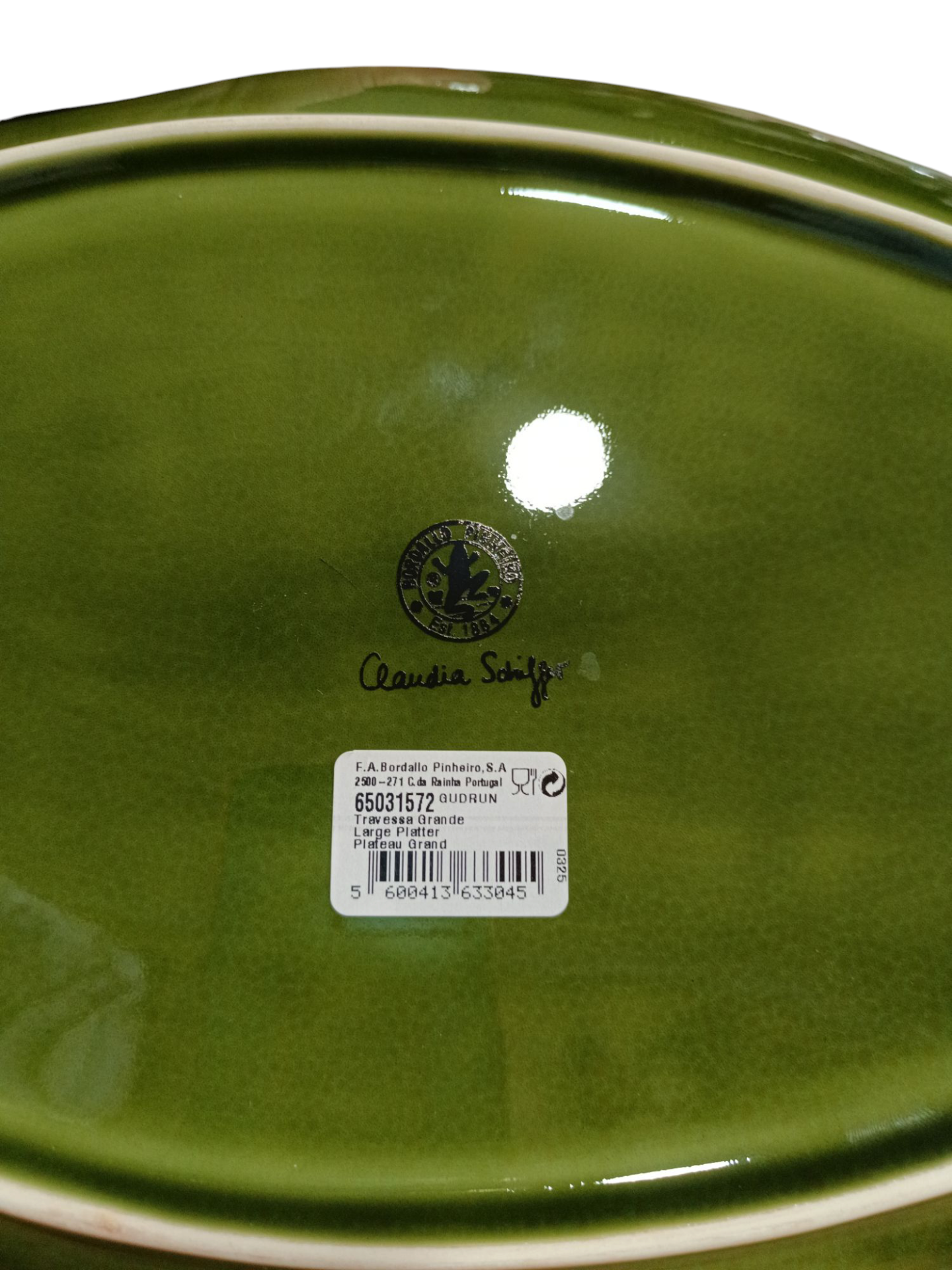 Base oval verde brilhante de cerâmica com etiqueta e texto