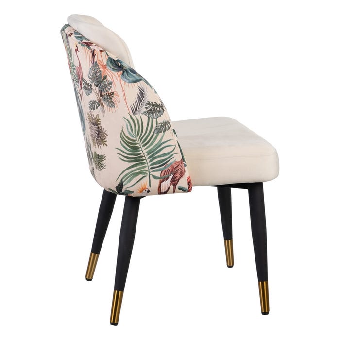 Cadeira com assento bege e encosto floral com pernas pretas e douradas