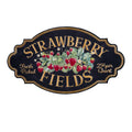Selo decorativo com ilustração de morangos e texto 'STRAWBERRY FIELDS Fresh Picked 25¢ per Quart'