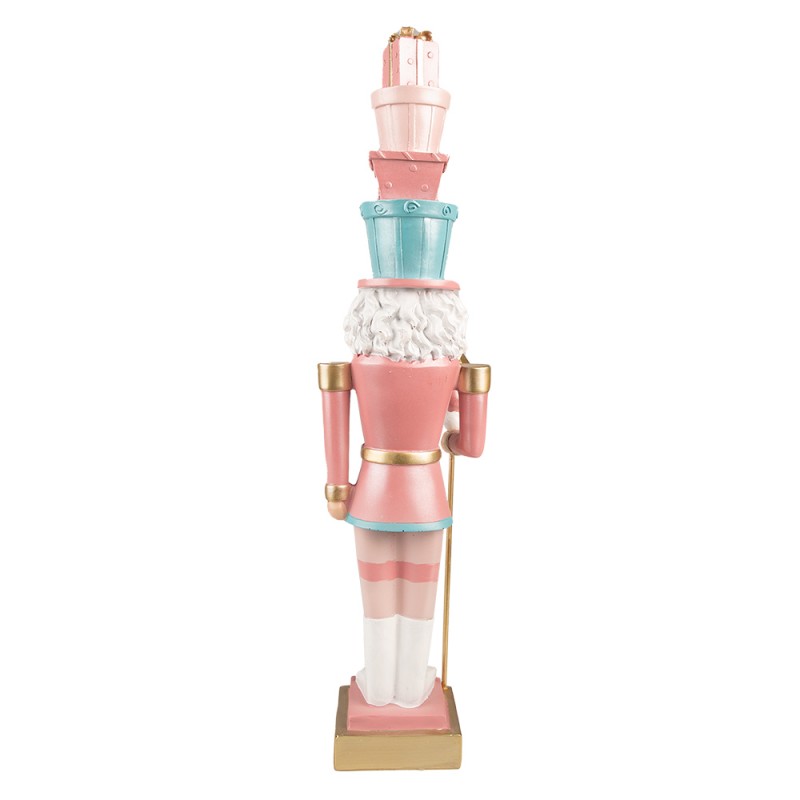 Estatueta de soldado de madeira colorida em azul, rosa, branco e dourado