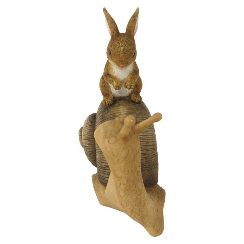 Estatueta de coelho castanho em caracol bege