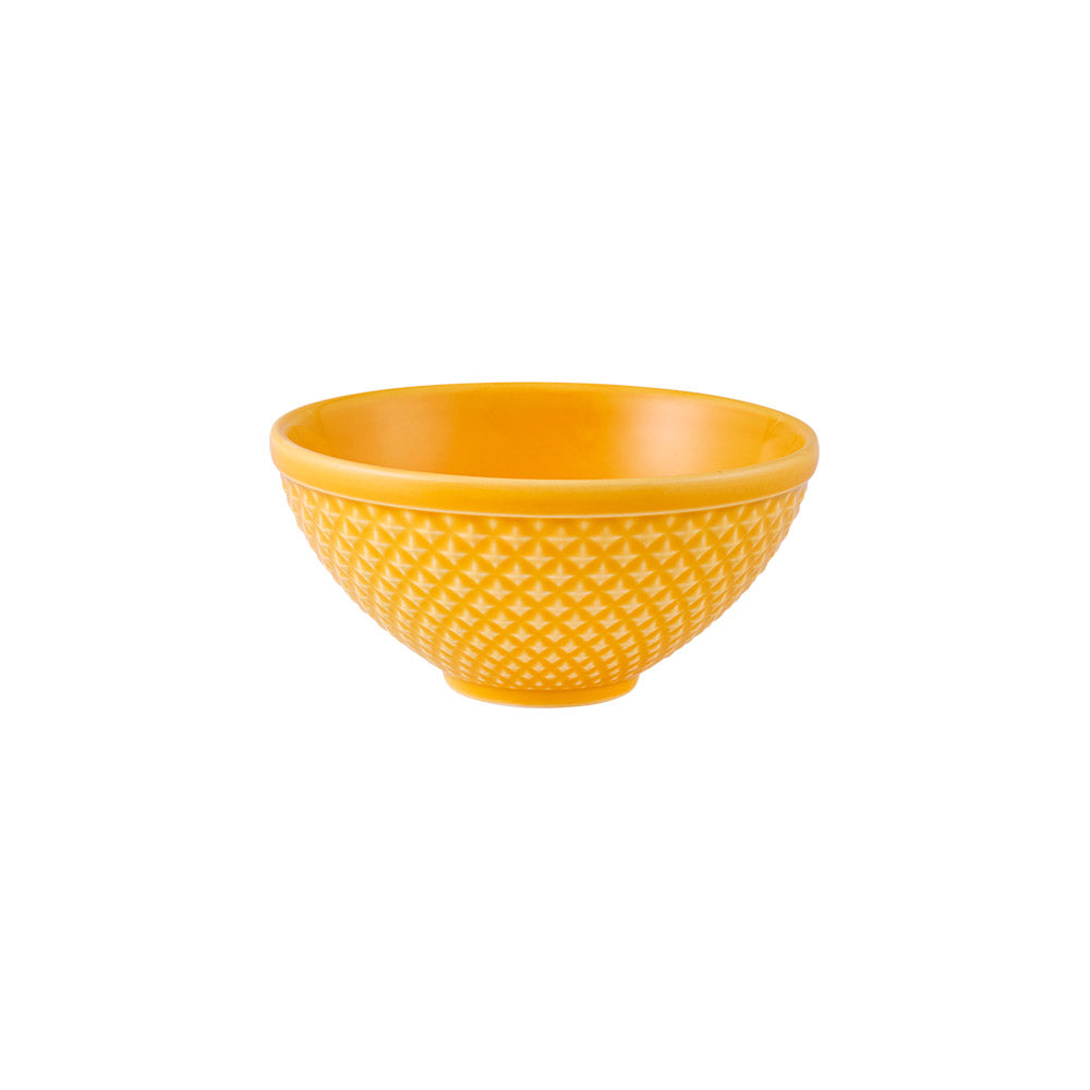 Taça amarela com textura geométrica exterior.