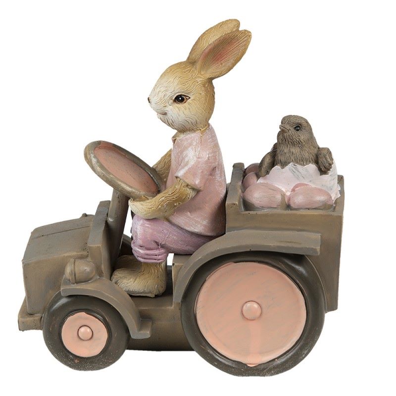 Figura decorativa de coelho a conduzir trator com pássaro