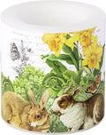 Vela decorativa com ilustrações de coelhos, flores amarelas e borboletas