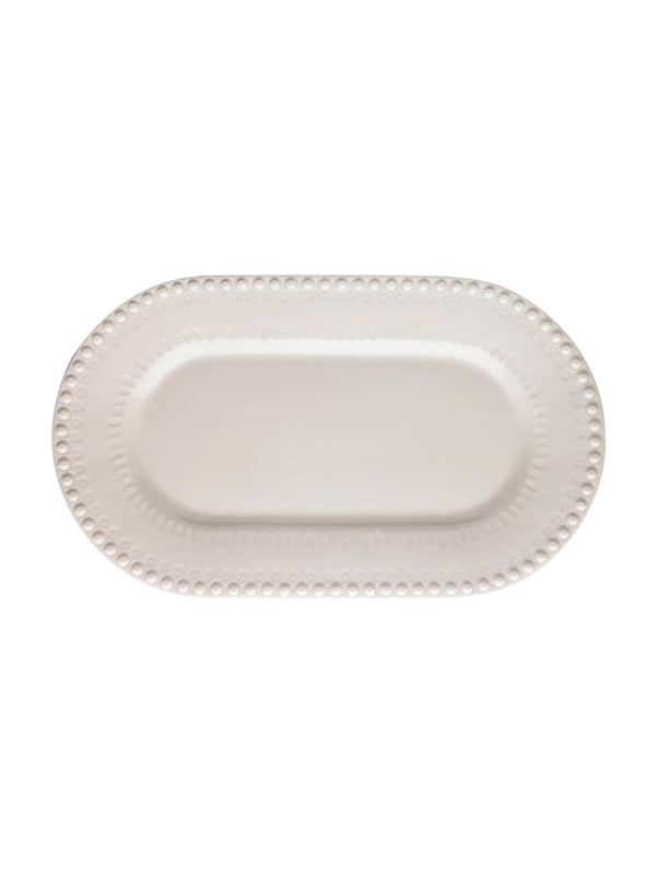 Prato oval branco com padrão de bolinhas na borda