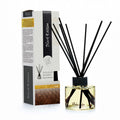 Difusor Mikado Black Edition com caixa e varetas pretas, vidro transparente e líquido amarelo
