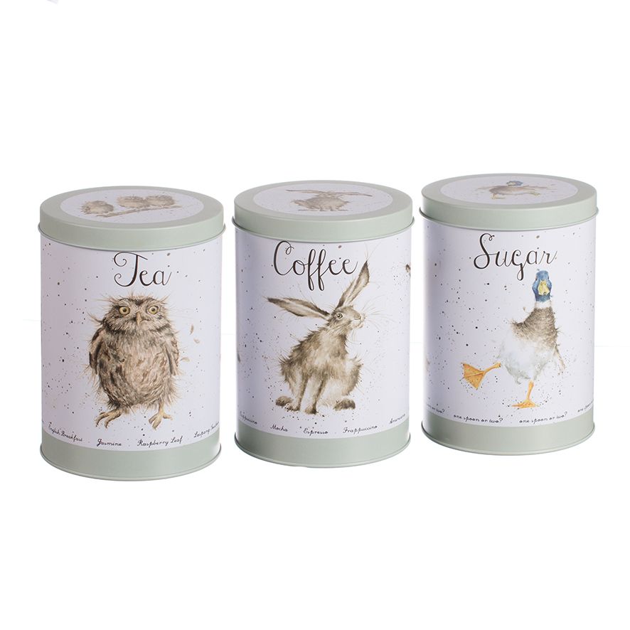 Três latas metálicas cinzentas com etiquetas ilustradas para chá, café e açúcar