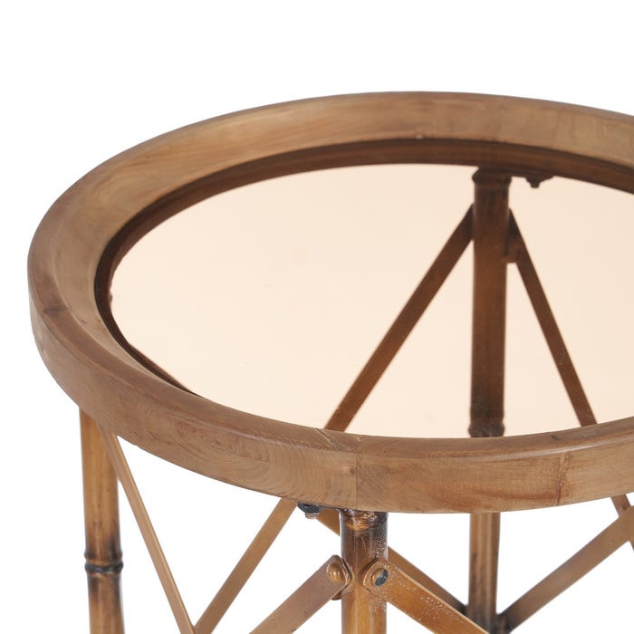 Mesa redonda com tampo de vidro e estrutura em madeira tipo bambu.