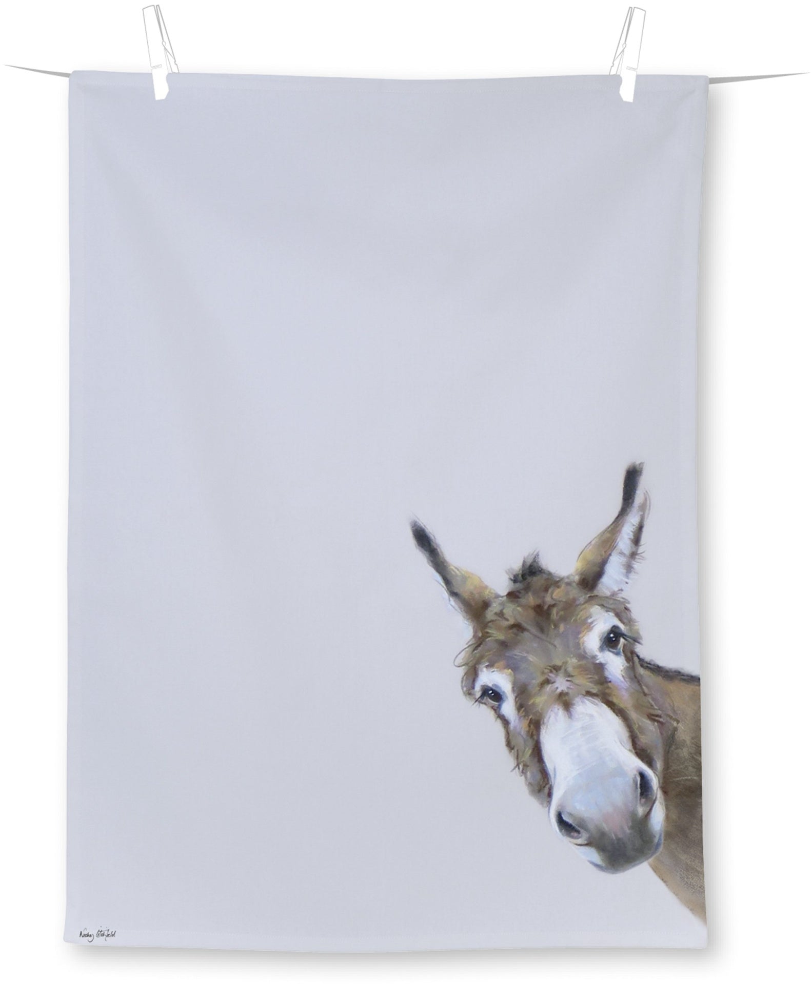 Toalha branca com desenho de burro no canto inferior direito