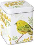 Lata quadrada branca com ilustração de pássaro amarelo e folhas verdes com bagas amarelas