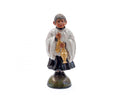 Figura decorativa de cerâmica com rapaz de túnica branca a segurar objeto dourado